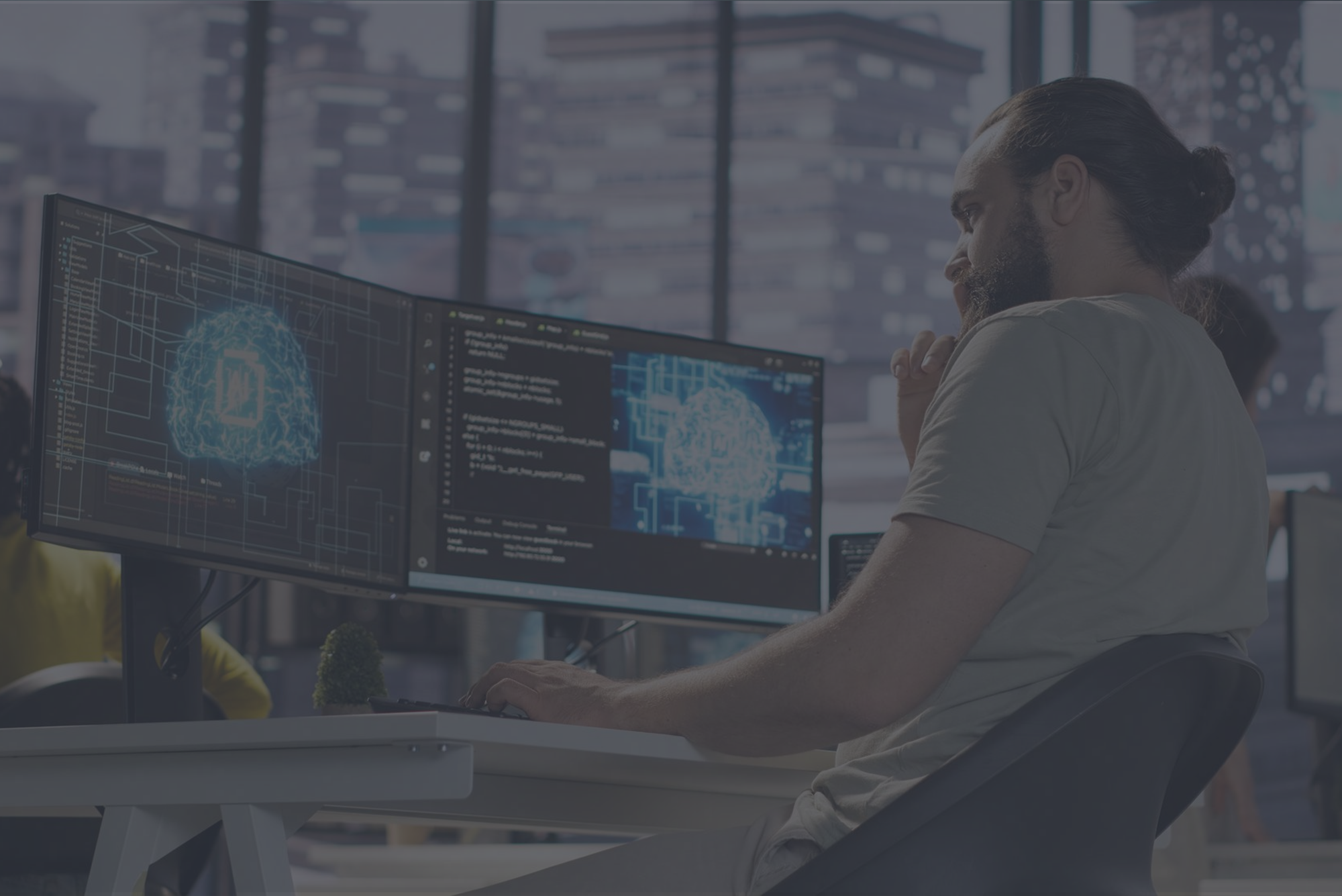 Man monitoring and maintaining artificial intelligence company systems