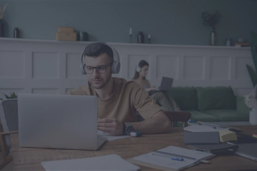 Man on laptop doing cyber security